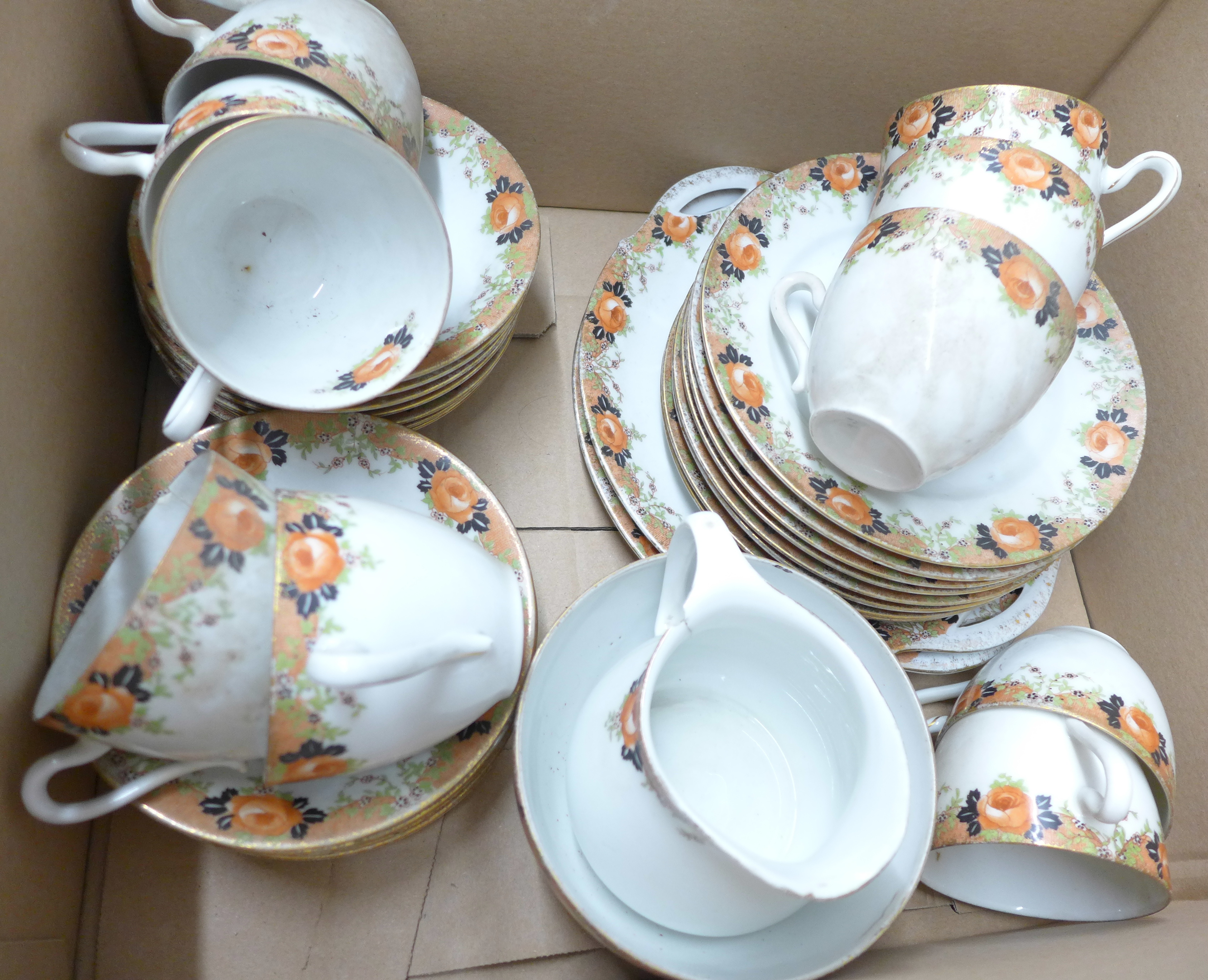 A floral decorated china tea service, some pieces a/f **PLEASE NOTE THIS LOT IS NOT ELIGIBLE FOR