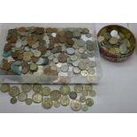 A collection of coins including British and foreign (200g of 50% silver coins)