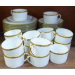 A Limoges coffee service, fifteen cups, saucers and medium plates