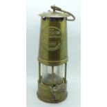 A Eccles miner's safety lamp