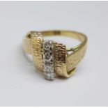 A 1970's style, yellow metal and diamond ring, marked 14K, 4.6g, R