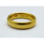 A 22ct gold wedding band, 7.2g, K