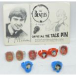 Beatles collection; 1960's, four flasher rings, four plastic giveaway rings and a George Harrison