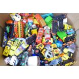 A box of mixed die-cast model vehicles