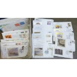 Stamps; a box of first day coves in album and loose, many silver covers