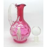 A Mary Gregory style cranberry glass decanter, a/f, cracked