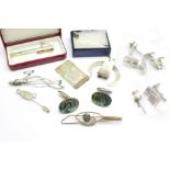 Silver cufflinks and tie-clips, a silver Euro money clip and one other novelty silver clip