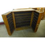 A Victorian scumbled pine railway station masters ticket cabinet, 89cms h, 84cms w, 27cms d