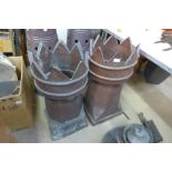 A pair of glazed terracotta chimney-pots