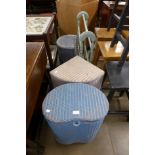 Three Lloyd Loom wicker linen baskets and a towel rail