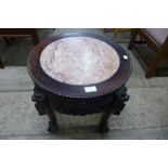 A Chinese marble topped padouk jardiniere stand