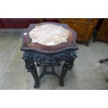 A Chinese marble topped padouk jardiniere stand, 58cms h