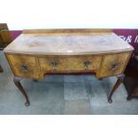 A George I style burr walnut desk