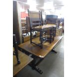 An oak refectory table and four chairs