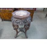 A Chinese marble topped padouk jardiniere stand, 61cms h