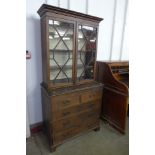 A George III oak bookcase on chest