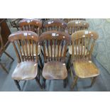 A Harlequin set of six elm and beech kitchen chairs