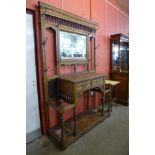 A Victorian Aesthetic Movement carved oak hallstand, manner of Bruce Talbert