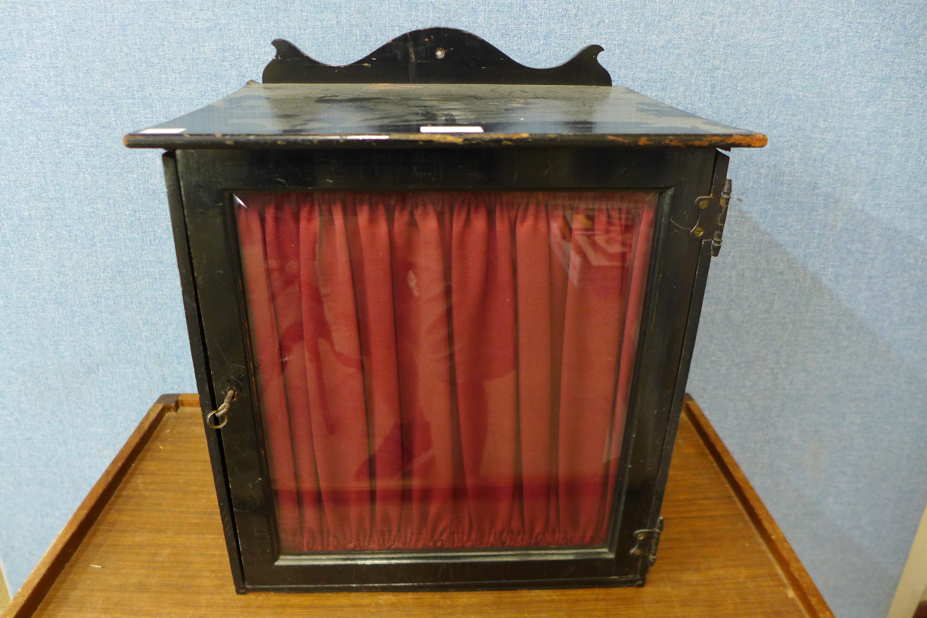 A Victorian ebonised table top collectors cabinet