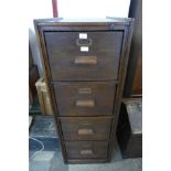 An early 20th Century oak filing cabinet