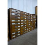 A Victorian oak museum cabinet, with five banks of nine drawers, 86cms h, 167cms w, 40cms d