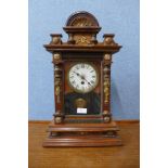 A 19th Century American beech and gilt metal mounted mantel clock