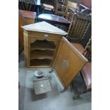 A pine wall hanging corner cabinet, an oak fire screen and a set of scales