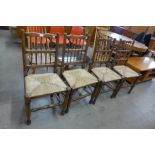 A set of four elm and beech spindle back chairs