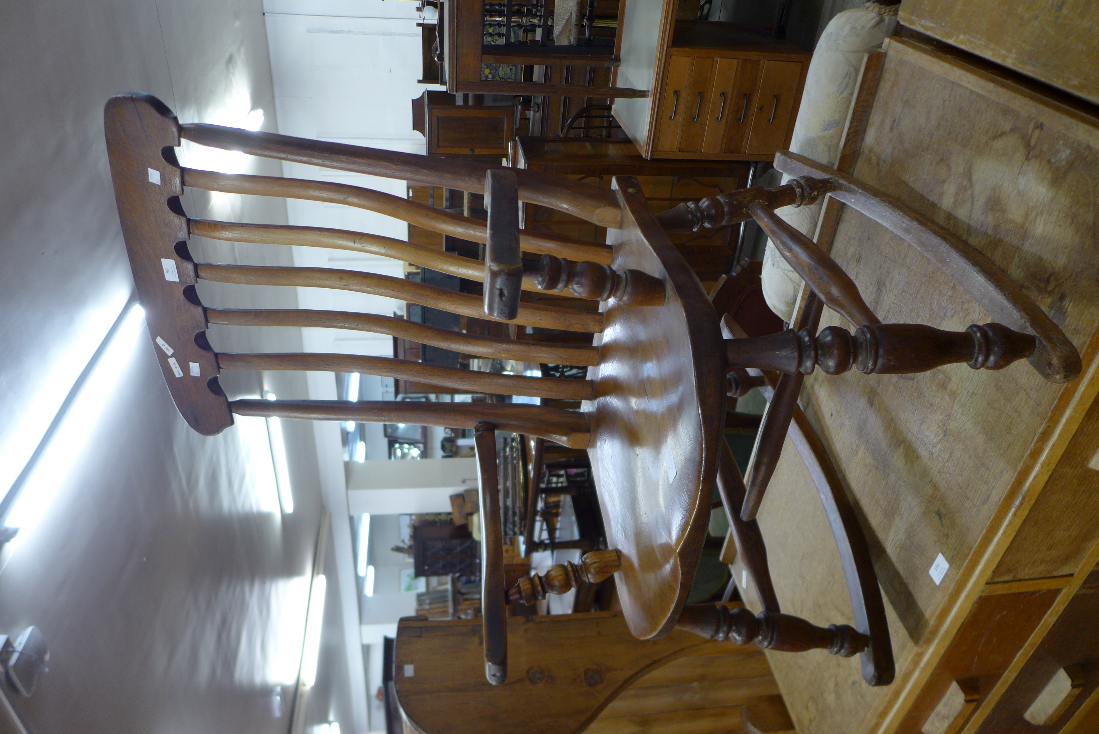 A Victorian elm and beech farmhouse rocking chair