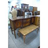 A set of four Parker Knoll armchairs, a mahogany sideboard and two coffee tables