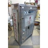 An Embassy cigarette machine vending case