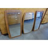 Three teak framed mirrors