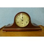 A mahogany mantel clock