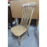 A Victorian elm and beech kitchen chair