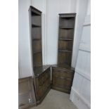 A pair of Ercol Old Colonial corner cabinets