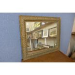 A gilt gesso framed mirror