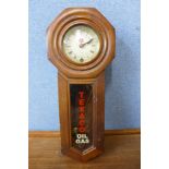 A walnut wall hanging timepiece, bearing Texaco Oil Gas inscription to the door