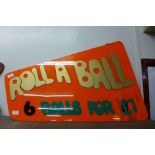 A double sided fairground Rolla Ball perspex sign