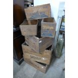 Assorted vintage wooden advertising crates