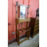 An Arts and Crafts oak hallstand