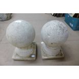 A pine of concrete ball finials