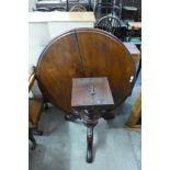 A Victorian mahogany circular breakfast table on associated base