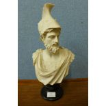 A faux marble bust of Roman man, on ebonised socle