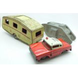 A 1960's friction tin-plate model Fire Chief car, a Mettoy tin-plate model caravan and a model WWI