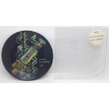 An OMD 7" picture disc, signed