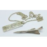A silver Concorde brooch and a silver ingot pendant with chain, 26g