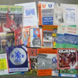 A collection of football programmes and a Mexico 1970 Soccer Stars sticker album