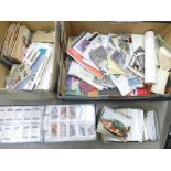 Two boxes of ephemera including postcards, cigarette cards and tea cards, etc.