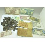 A collection of sixpences and foreign banknotes