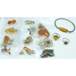 A collection of silver mounted amber jewellery